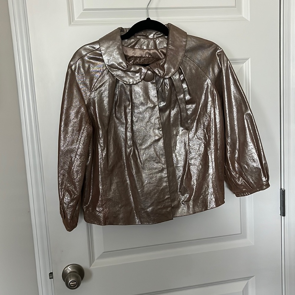Classy swing jacket, gorgeous bronze, 100% leather, excellent condition.